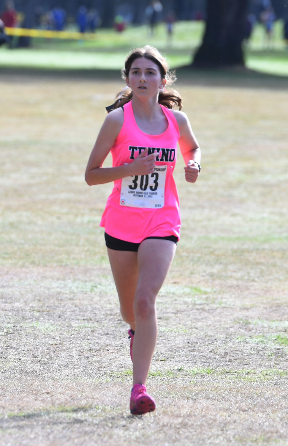 Tenino distance runner Haley Huber crosses the finish line at the 1A District 4 Cross Country Championships Oct. 27 at Lewis River in Woodland.